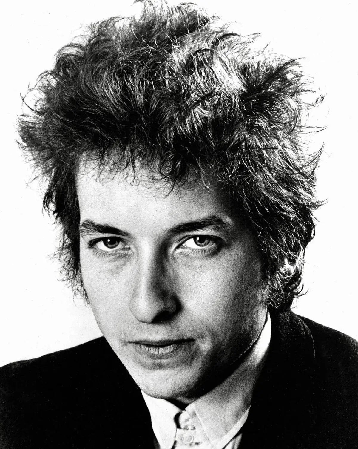 Black-and-white portrait of Bob Dylan in close-up.